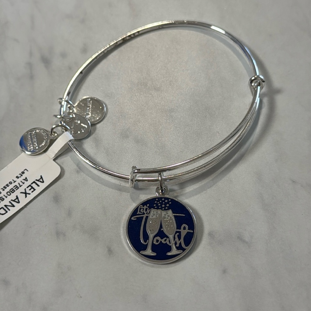 New with tag (slight tarnish) let’s toast Alex and Ani bracelet